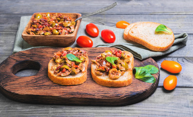 Two bruschetta sandwich