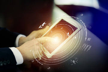 Man using tablet against high tech background