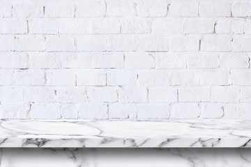 Empty white marble table on white brick wall background.