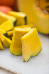 Pumpkin pieces on a cutting board