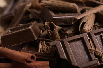 Chocolate pieces with cinnamon, background