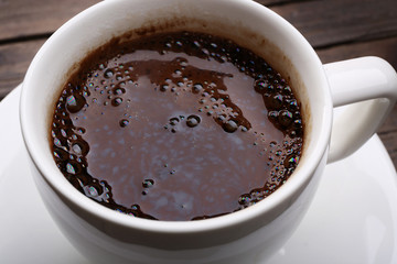 Cup of fresh coffee, closeup