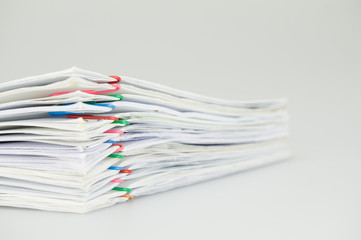 Pile overload paperwork of report on white background