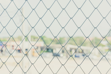 Fototapeta premium steel grate and blur of city background, Pastel Color
