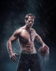 Fototapeta premium Portrait of shirtless wet bascetball player.
