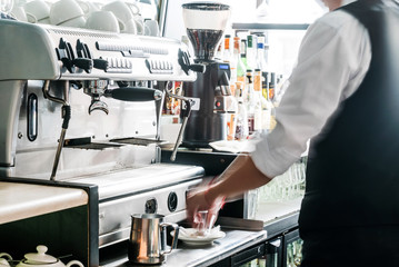 barista making coffee