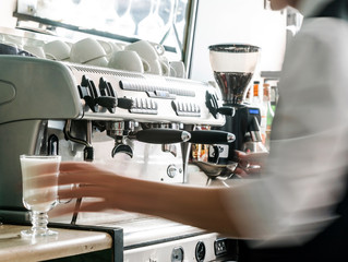barista making coffee