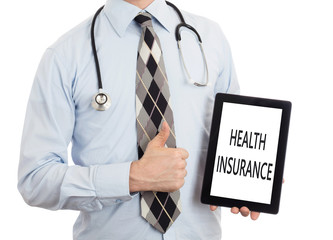 Doctor holding tablet - Health insurance