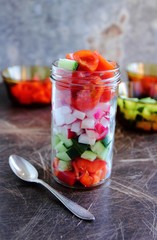 Jar with fresh cutted vegetables