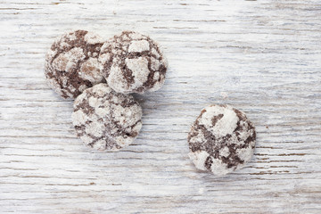 Chocolate cookies  on light wooden background