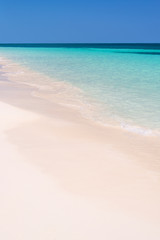 Fototapeta na wymiar Sand and caribbean sea background