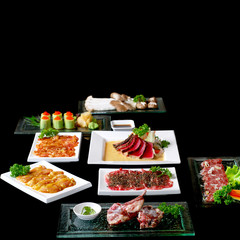 Premium raw japanese kobe beef sliced on plate with black pepper