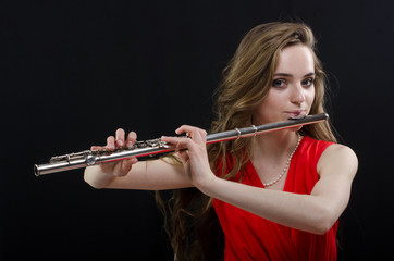 girl playing the flute © vladimirvu