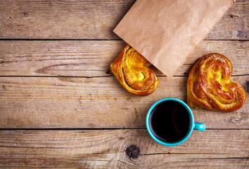 homemade pastries. bun heart in a paper bag. for Breakfast with