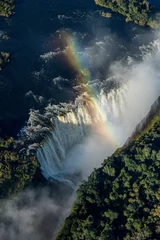 Crédence de cuisine en verre imprimé Photo aérienne Aerial view of rainbow crossing Victoria Falls