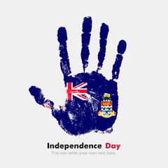 Handprint with the Flag of Cayman Islands in grunge style