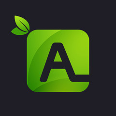 Letter A logo with square and green leaves.