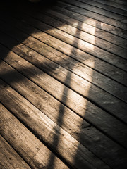 wooden floor with ray of sun light