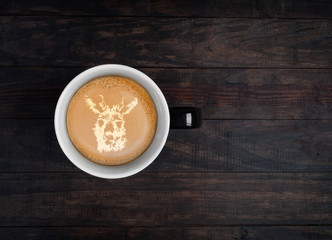 Latte art - portrait of kangaroo made on froth on a cup of coffee. Top view with copy space