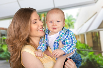 Happy young mother and her son