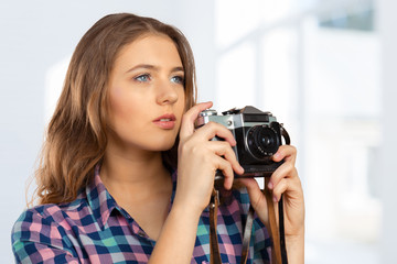 Woman photographer with camera