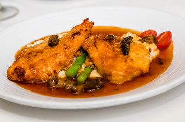 Veal Marsala on Asparagus