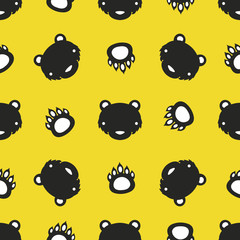 Vector illustration with cute cartoon seamless pattern. Bear head, yellow background and paw