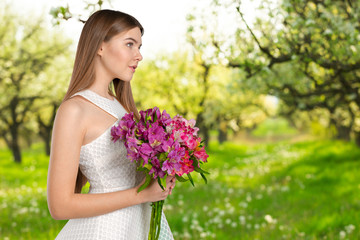 Naklejka premium Woman with Spring Flower bouquet