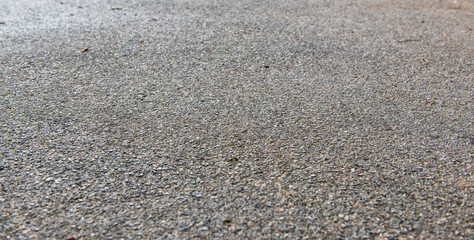 Closeup of paved road. Road stone texture