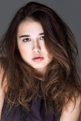 Naklejka premium portrait of fashion model with stylish hair