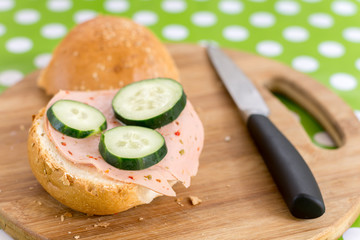 Salami sandwich with sliced cucumber