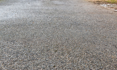 Closeup of paved road. Road stone texture