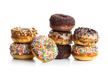various donuts on white background