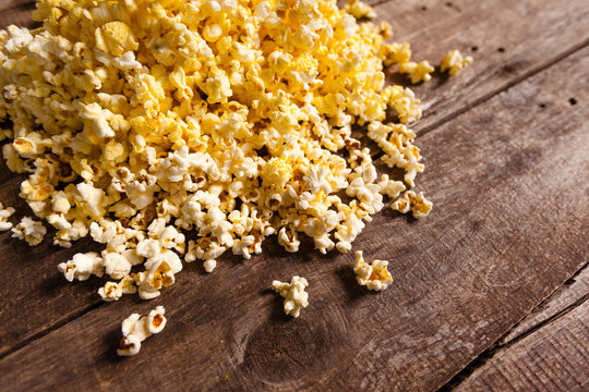 Popcorn on wooden background