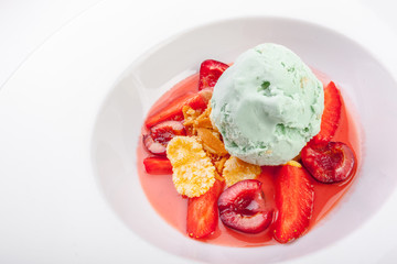 Strawberry soup with ice cream