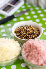 Grated yellow cheese, grated ham and baked sesame