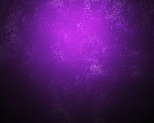 The textured grunge background the lit wall, violet