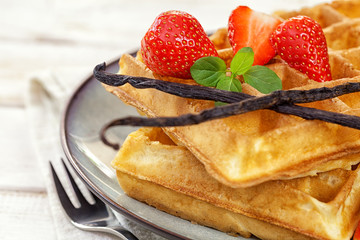 Waffles with Fresh Strawberries and Vanilla beans - close up