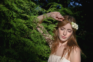 Pretty lady in short black dress and high heels posing