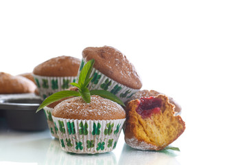 sweet baked muffins with jam inside