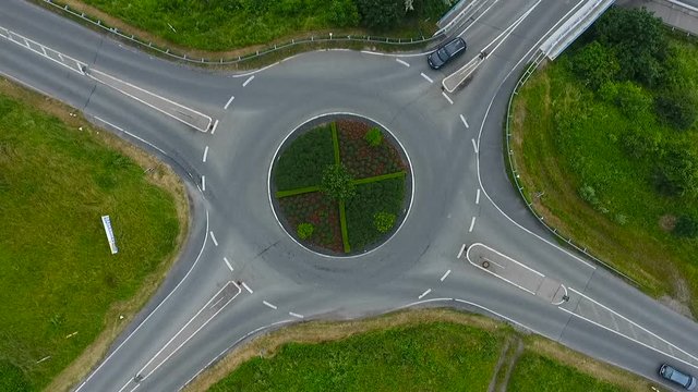 Traffic circle roundabout aerial view - time lapse