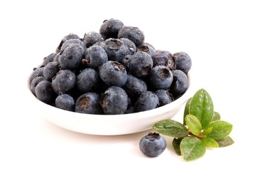 Blueberries isolated on white background. Blueberries in bowl.