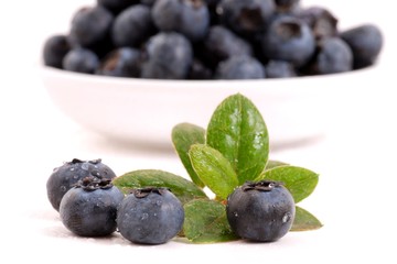 Blueberries isolated on white background. Blueberries in bowl.