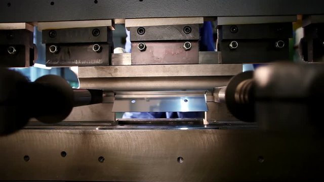 High-tech robotic manufacturing. Timelapse footage of the process of forming parts for metal flues and ventilation systems.