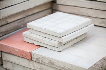 Obraz na płótnie Canvas Pile of concrete square blocks for exterior paving