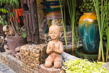 Traditional Thai statuette outdoors