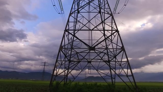 Observing big electric mast.