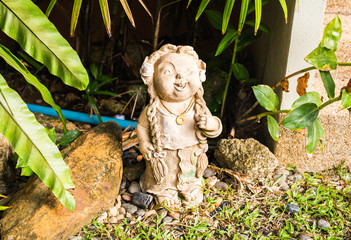 Traditional Thai statuette outdoors