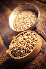 Buckwheat in wooden bowl