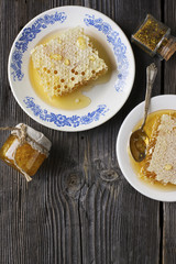 Still life with honey, honeycomb, pollen